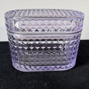 Purple Diamond-Cut Glass Trinket Box
Oval Lidded Glass Container 4x5x3" Lavender
